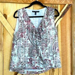 WHBM sleeveless dress shirt. Size 10. Color: white, pinks and tan